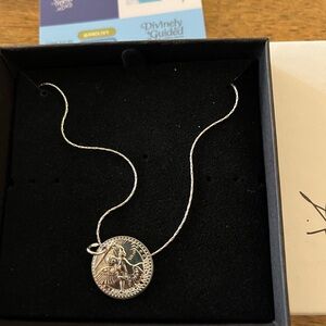 Silver religious necklace